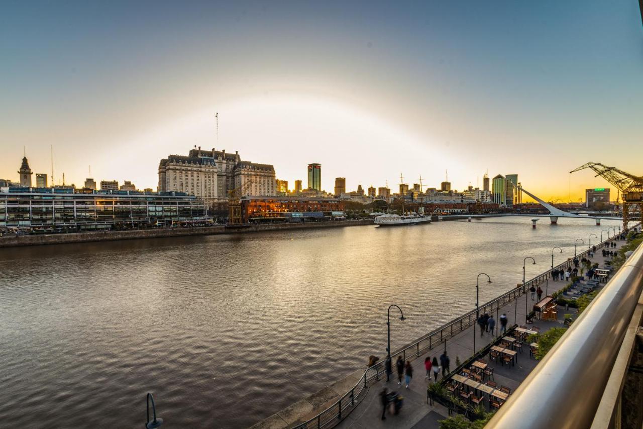 Family With Puente De La Mujer View In Puerto Madero Buenos Aires